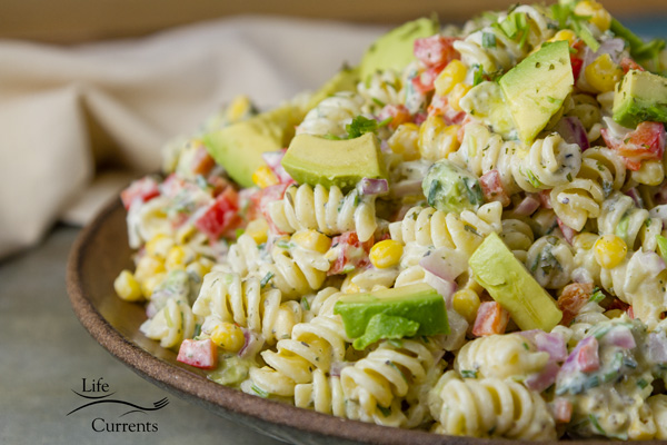 Skinny Avocado Ranch Pasta Salad is a nice creamy flavorful summer side dish close up on a pasta salad in a bowl.