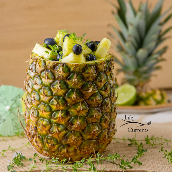 Pineapple Blueberry Fruit Salad in a Pineapple Bowl Fresh, sweet pineapple mingles with healthy blueberries all covered in a honey lime dressing.