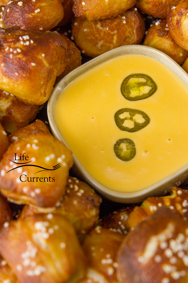 Candied Jalapeno Cheese Sauce - There&rsquo;s just something about rooting on your team during football season that calls for cheesy, gooey, indulgent comfort food, and this jalapeno cheese sauce totally delivers!