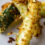 These healthy baked zucchini fries are a nice option for tailgating snacks month. Not everything has to be fried or cheesy to be delicious for game day!