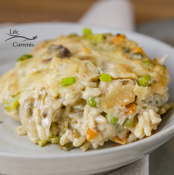 a serving of rice casserole on a small white plate. 