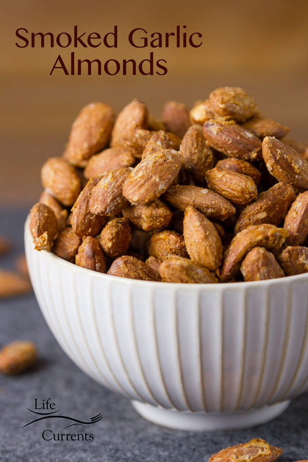 These Smoked Garlic Almonds are the best tailgating snack! Like “make a batch, sit down with a beer and these and watch the game while noshing away” snack! These Smoked Garlic Almonds are the best tailgating snack! Like “make a batch, sit down with a beer and these and watch the game while noshing away” snack!