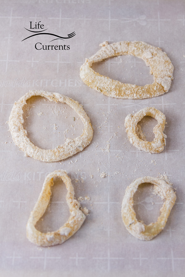 coated onion rings ready to be baked