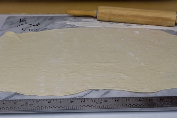 rolling and measuring the dough