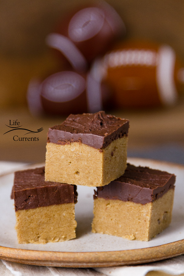 No Bake Peanut Butter Bars are the perfect tailgating snack for a sweet dessert treat. I mean, does it get any better than peanut butter and chocolate together in a simple and easy to make no bake treat!
