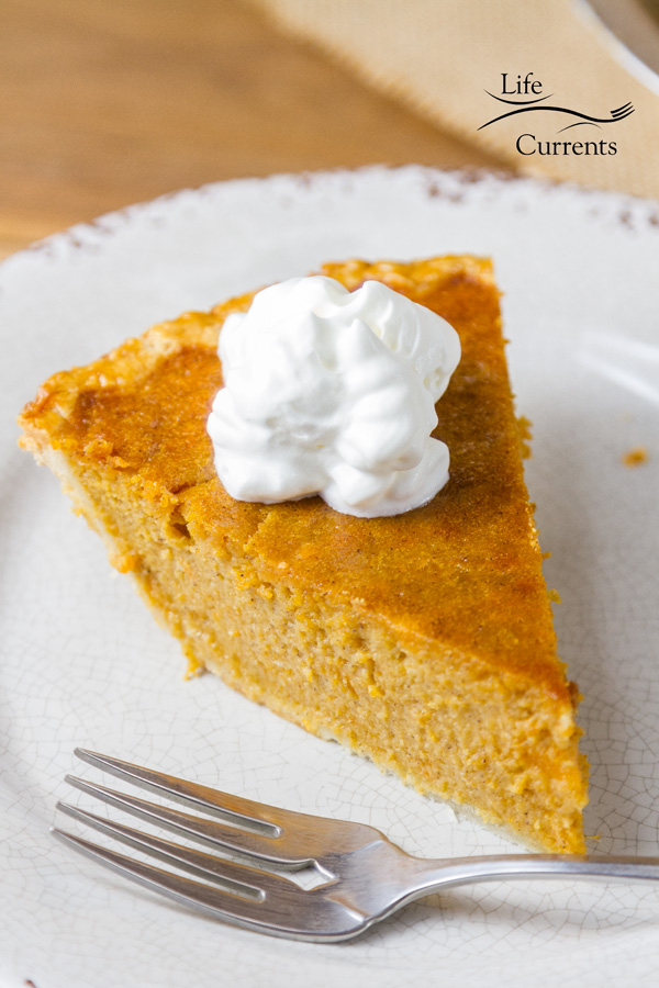 a slice of pie with whipped cream.