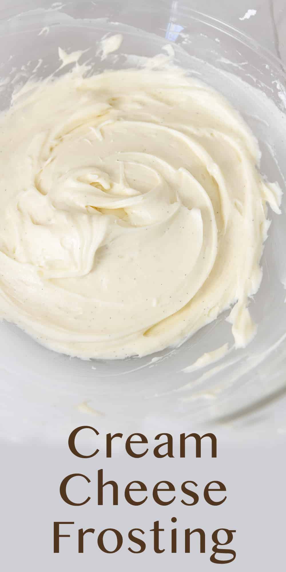 cream cheese frosting in a glass bowl.