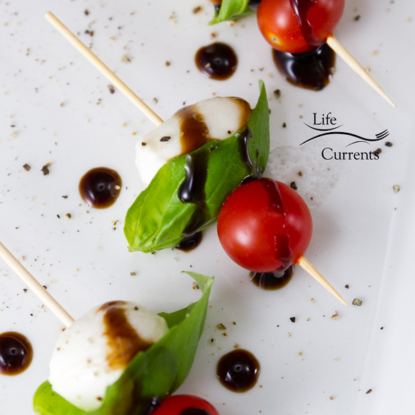 appetizer Skewers with tomatoes, basil, mozzarella and balsamic glaze