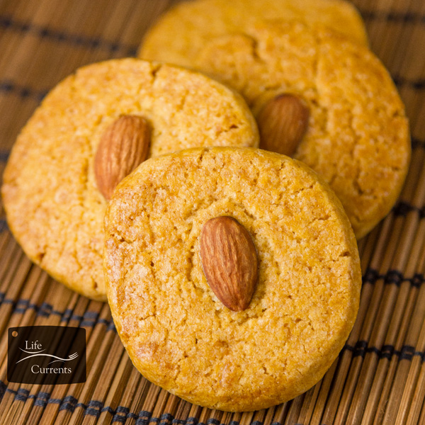 delicious & traditional Chinese Almond Cookies are dense, sandy, and crunchy. I much prefer the Chinese Almond Cookie to the more popular fortune cookie at the end of the meal! 