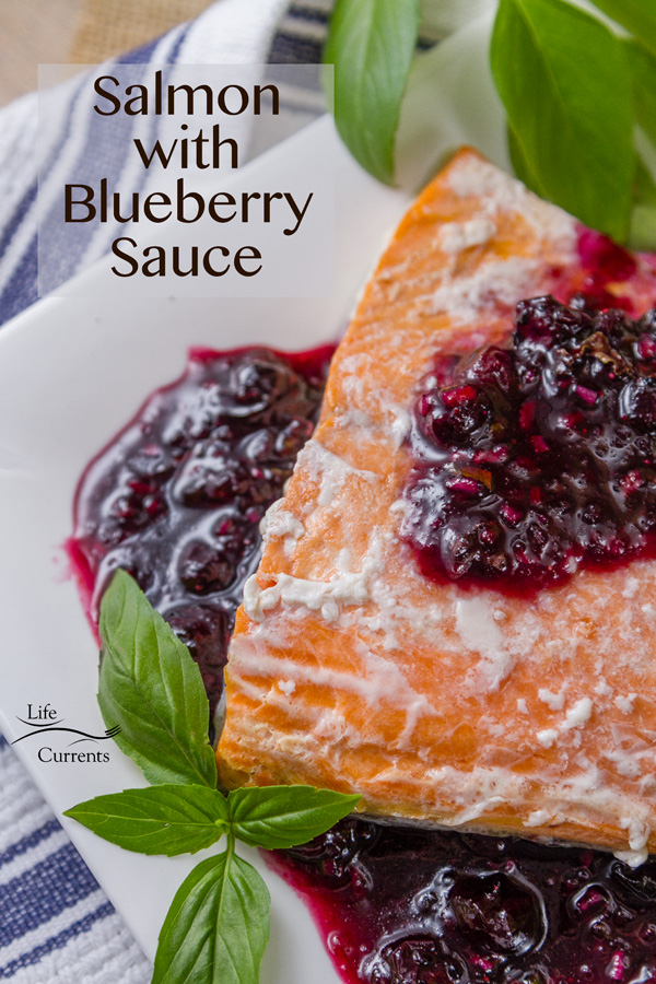 Salmon with Blueberry Sauce - Salmon fillets wrapped in a parchment paper pouch (en papillote) and baked in the oven, then topped with a special blueberry conserve that’s made especially for garnishing fresh salmon. Salmon with Blueberry Sauce - Salmon fillets wrapped in a parchment paper pouch (en papillote) and baked in the oven, then topped with a special blueberry conserve that’s made especially for garnishing fresh salmon.