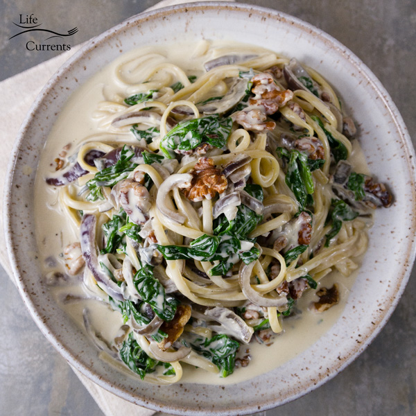 I served this Blue Cheese Spinach Walnut Sauce over linguini pasta. Oh and it&rsquo;s so good! But you can also serve it over any protein like chicken or steak