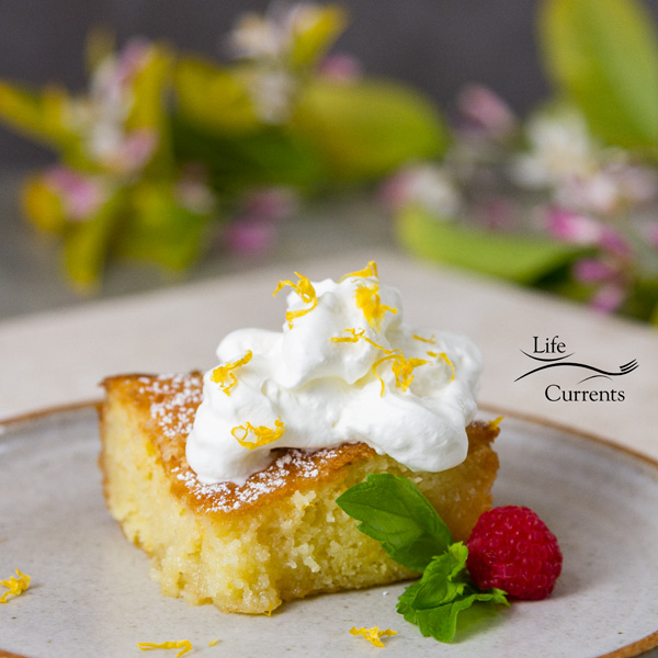 Lemon Cake on a plate with raspberries