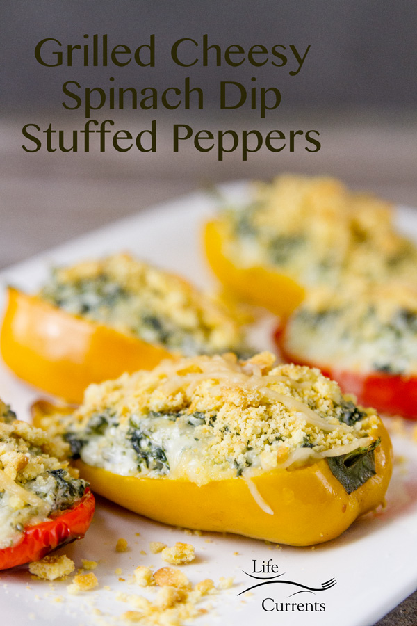 Super easy to make, and really fun to eat, these Grilled Cheesy Spinach Dip stuffed Peppers will be the life of the party! Super easy to make, and really fun to eat, these Grilled Cheesy Spinach Dip stuffed Peppers will be the life of the party!