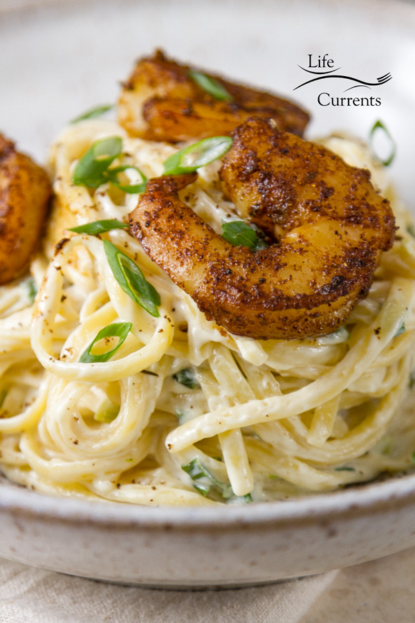 Blackened Shrimp Pasta Cajun shrimp over a creamy cheese sauce ready in less than 30 minutes