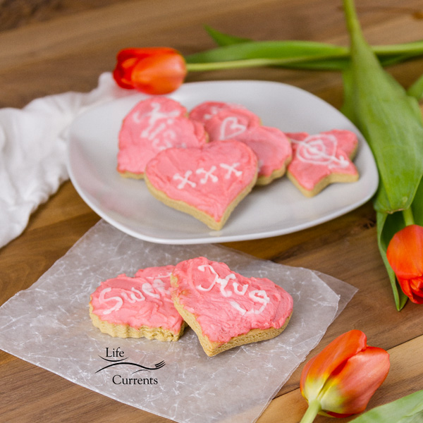 Every year for Valentine&rsquo;s Day my mom makes these Cut Out Cookies. Then she frosts them with Aunt Lois&rsquo; Frosting. And she&rsquo;s sweet enough to share these frosted cut out cookies with me. 