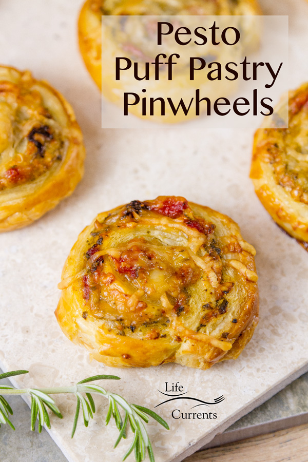 Pesto Puff Pastry Pinwheels with Sun Dried Tomatoes and Roasted Red Peppers are elegant appetizers that&rsquo;ll impress your guests. 