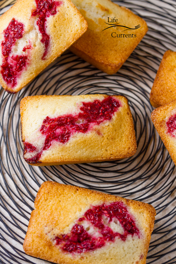 French Almond Financiers Cakes Recipe with Roasted Raspberry Swirl on a wire rack for serving 