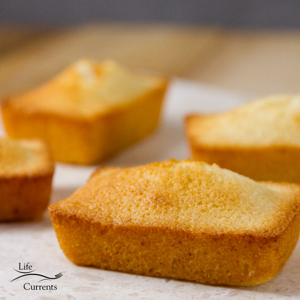 square image of four Financiers (French Almond Cakes) 