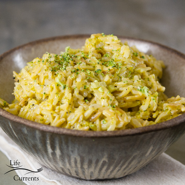 Instant Pot Rice-a-Roni Recipe served in a grey and white ceramic bowl, a square image on a grey background