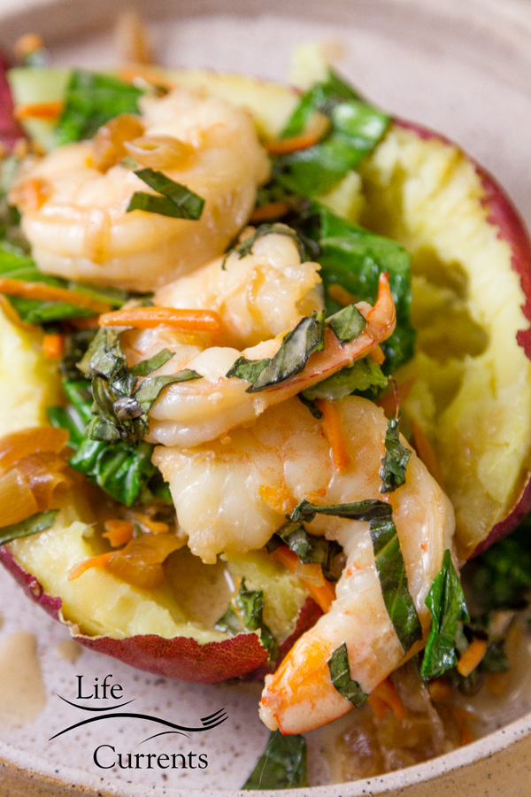 shrimp and veggies stuffed in a baked sweet potato 