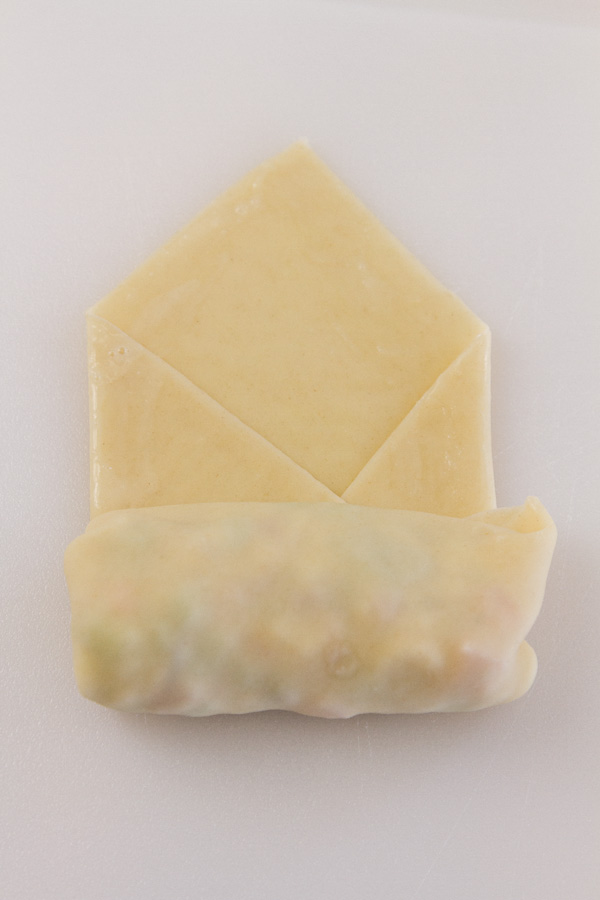 How to roll an Egg Roll: roll up over the filling.