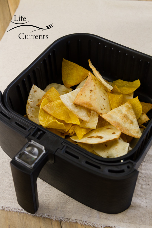 tortilla chips in the basket of the air fryer 