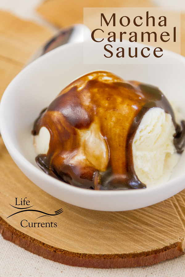 Mocha Caramel Sauce over vanilla ice cream in a white bowl on a wood backdrop
