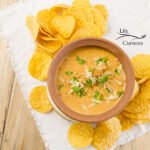 top down view of Mexican Chili Cheese Dip with tortilla chips