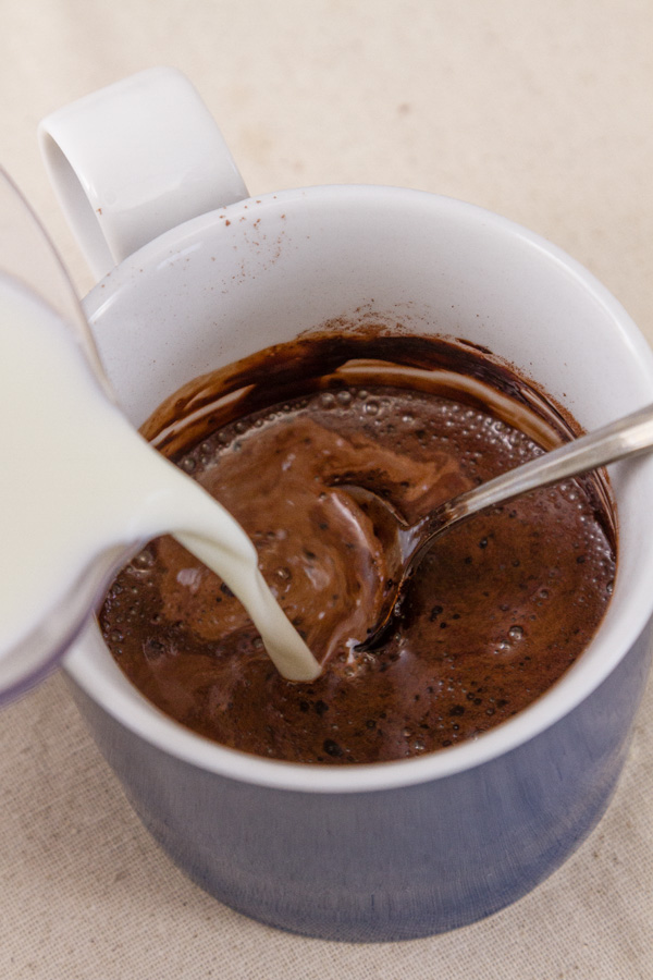How to make Single Serving Hot Cocoa: Stir in the remainder of the milk until the mug is full. 