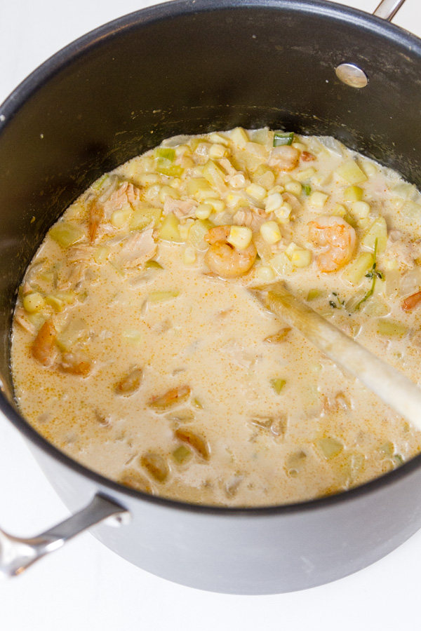 This Cajun Seafood Chowder is rich and creamy, with just the right amount of Cajun spiced seafood including shrimp and tuna, along with sweet corn and earthy potatoes. It’s perfect comfort food that will make you happy Cajun seafood chowder still in the pot