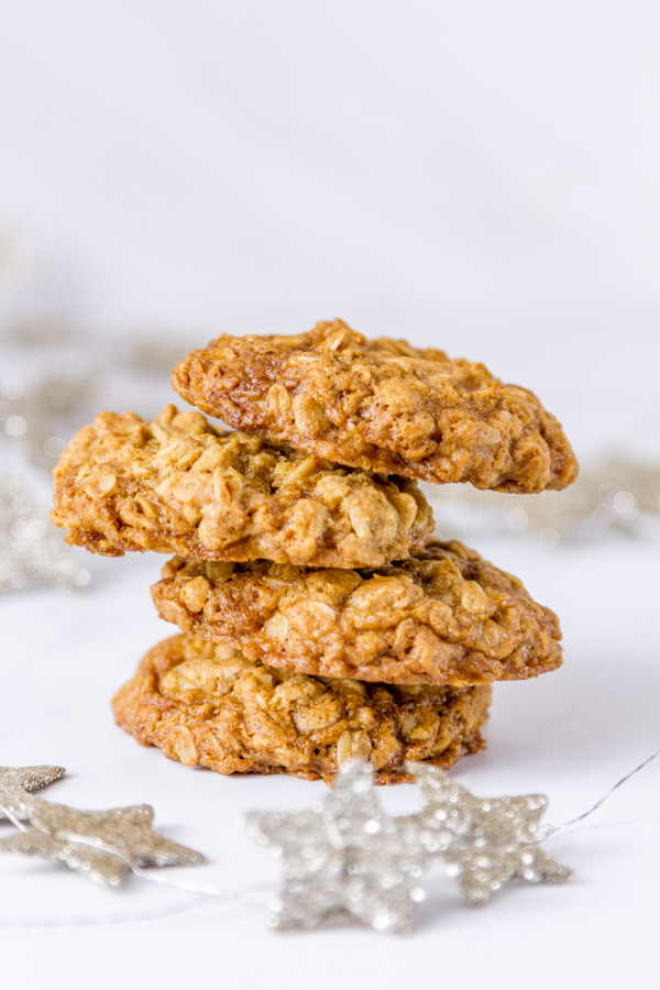Crispy edges, chewy in the middle, and wholesome perfectly balanced Famous Oatmeal Cookies. These are my favorite cookies, and they are the classic original recipe! So good, they’re famous. In fact, this is the original recipe from the side of the oatmeal carton that my mom always made when I was a kid. a stack of oatmeal cookies