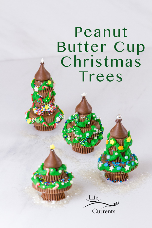 4 Christmas trees made from peanut butter cups decorated with icing and sprinkles and the title