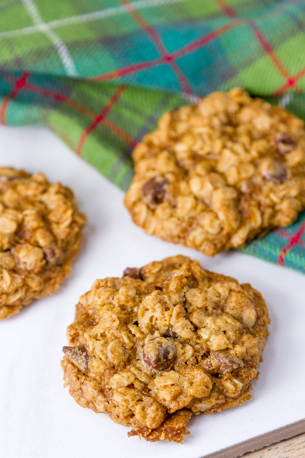 Chocolate Chip Oatmeal Cookies Crispy with edges and chewy in the middle chocolate chip oatmeal cookies with a green and red napkin