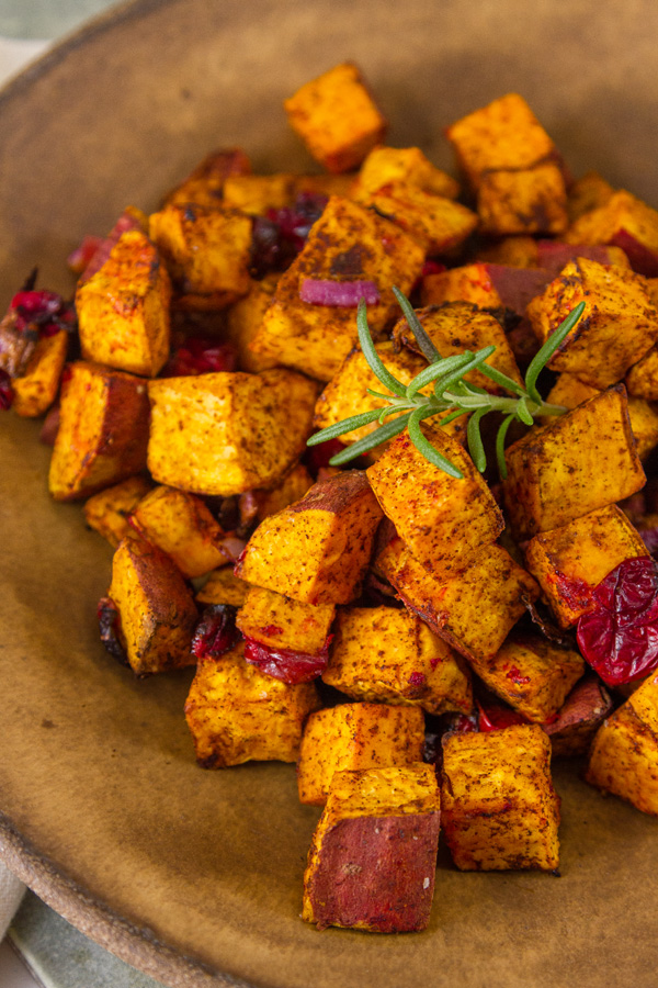 roasted sweet potatoes in a brown bowl