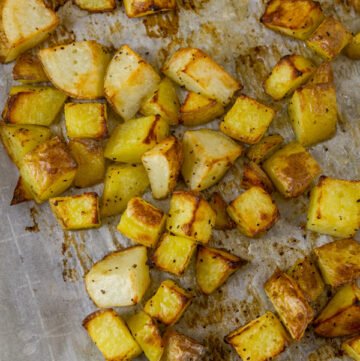 Sheet Pan Roasted Potatoes on a parchment paper