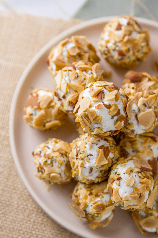 top down of Pepper Jelly Cheese Balls stacked on a plate 