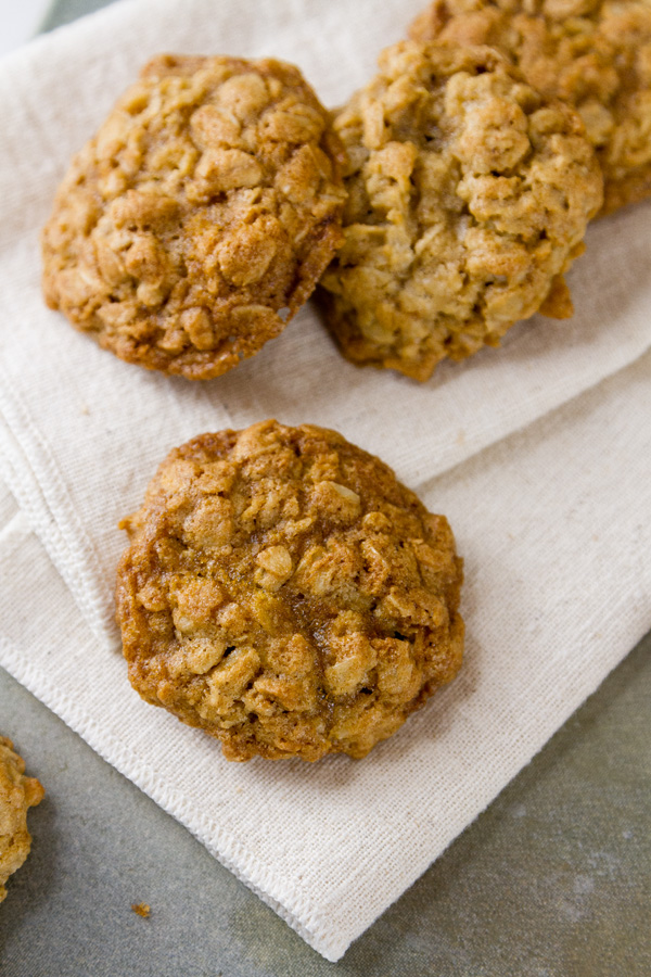 Chewy Eggnog Oatmeal Cookies with crispy edges and the classic festive taste of eggnog. These will be a hit with your family and Santa. Eggnog Oatmeal Cookies festive cookies on a napkin