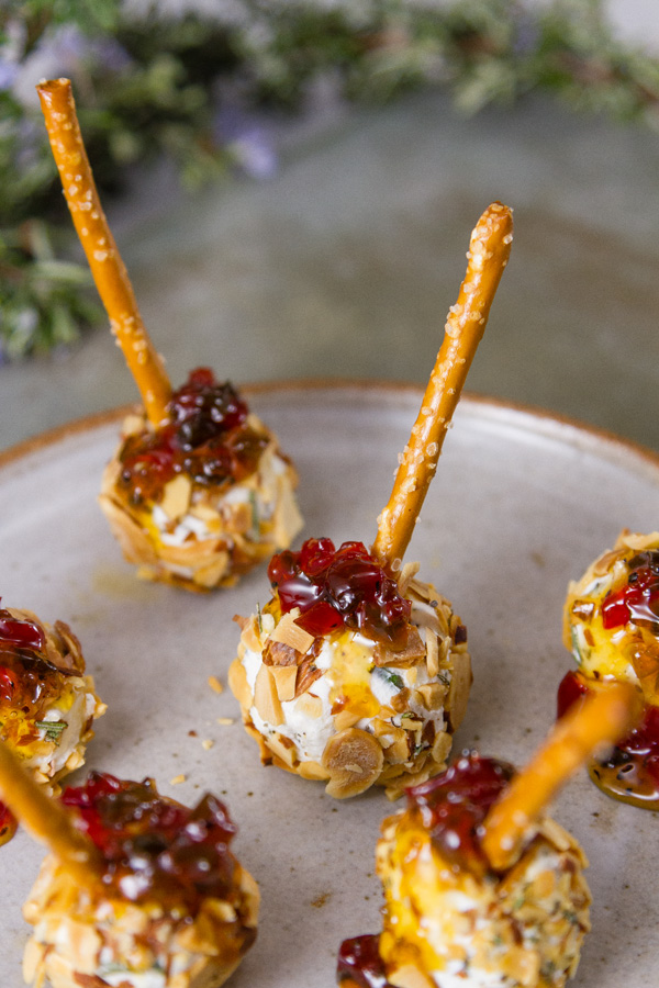 Pepper Jelly Cheese Balls with a dollop of pepper jelly on top