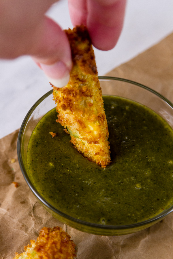 dipping an Air Fryer Avocado Fries with Cheesecake Factory Copycat Tamarind-Cashew Dipping Sauce
