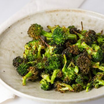 square crop of Air Fryer Roasted Broccoli in a white bowl