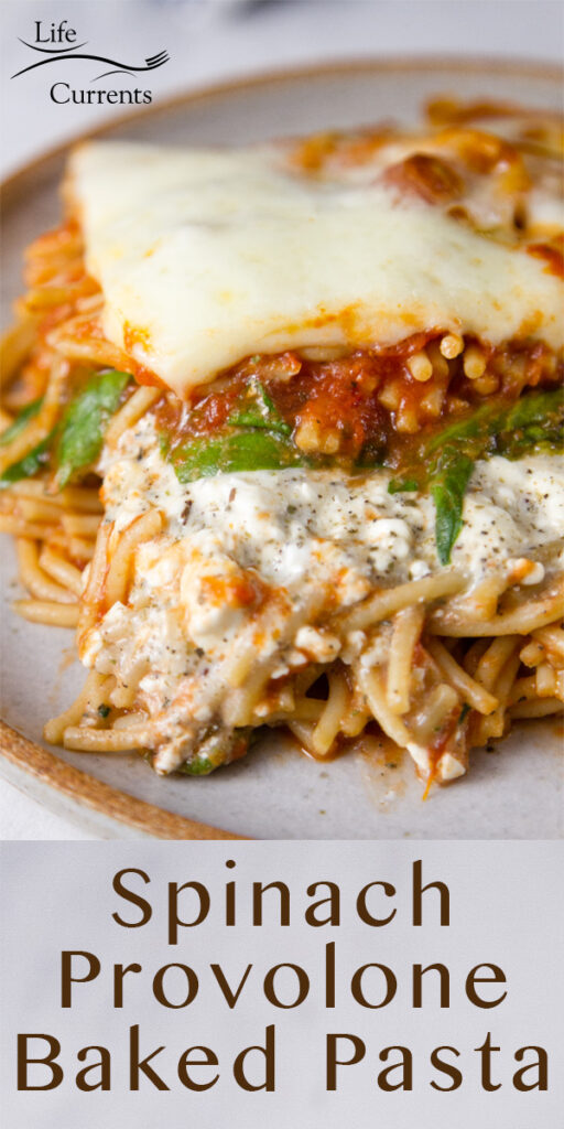 Spinach Provolone Baked Pasta close up on a white plate with the title undreneath 
