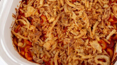 square crop of the baked casserole dish of chili mac.