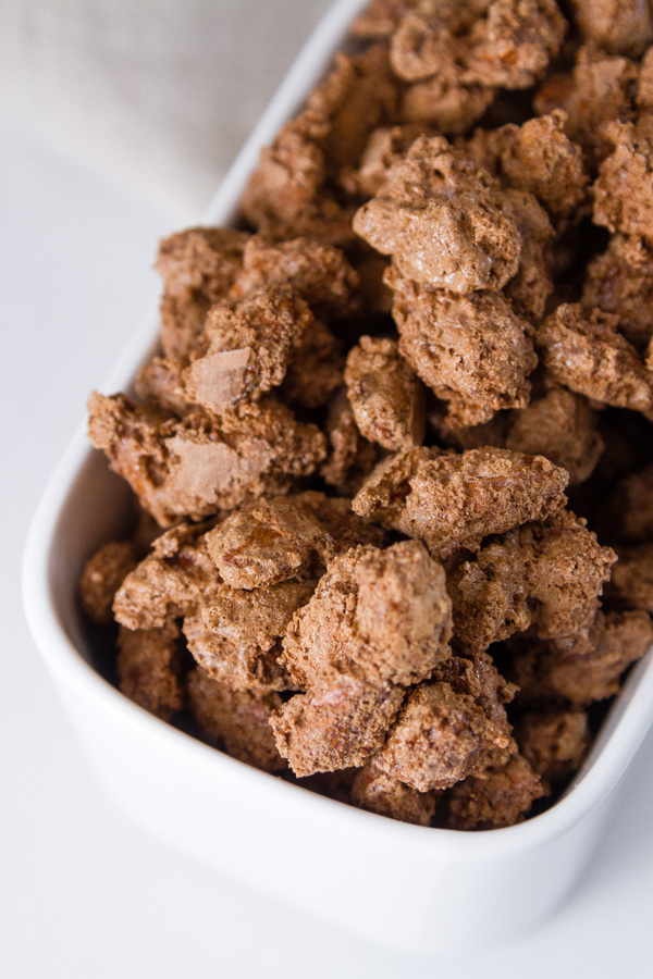 Mocha Candied Almonds in a white ceramic dish for serving 
