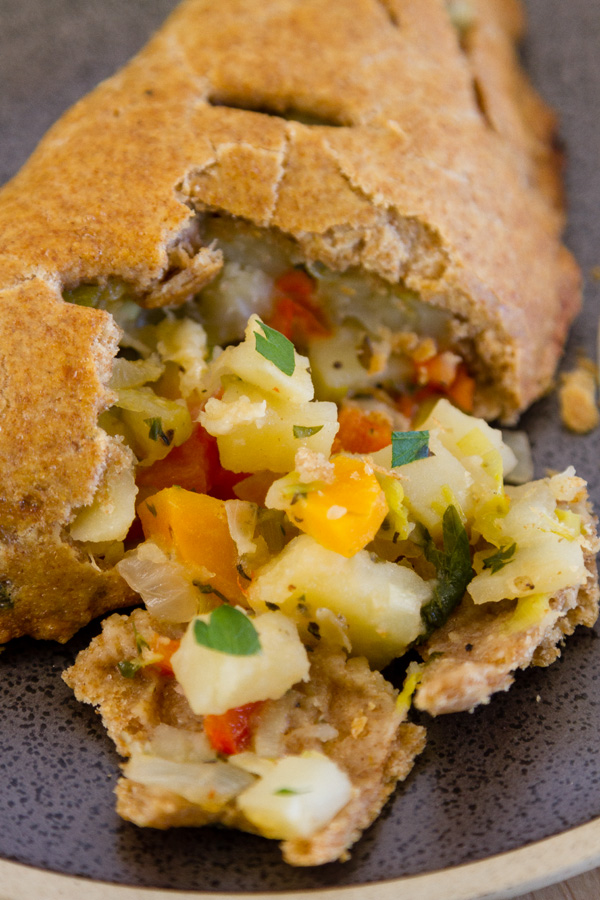 close up on the filling inside the veggie turnover