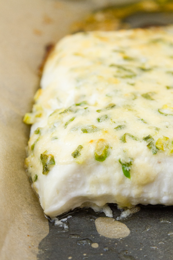 Here's the hlibut fresh out of the oven and still on the parchment lined baking sheet