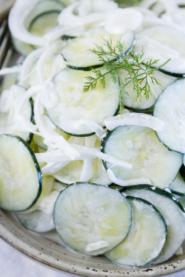 close up of salad in a bowl garnished with dill