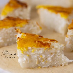 square crop of an image of cakes that are cut into triangles.