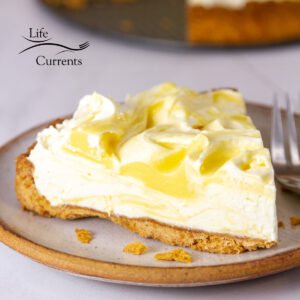 square crop of a slice of lemon cream pie.