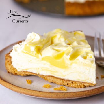 square crop of a slice of lemon cream pie.