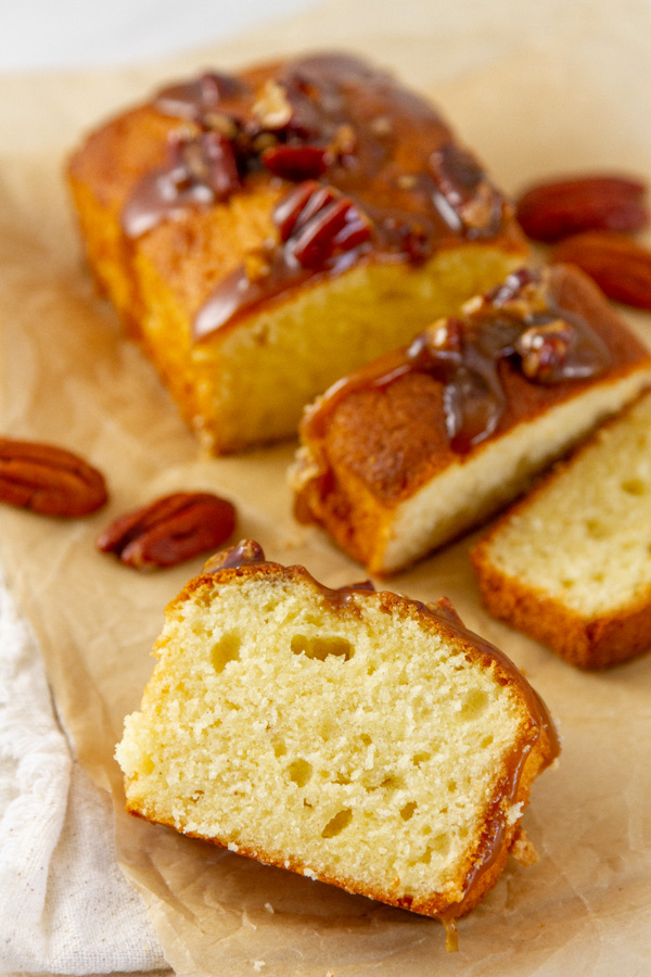 a loaf cake sliced open so you can see the texture of the cake.